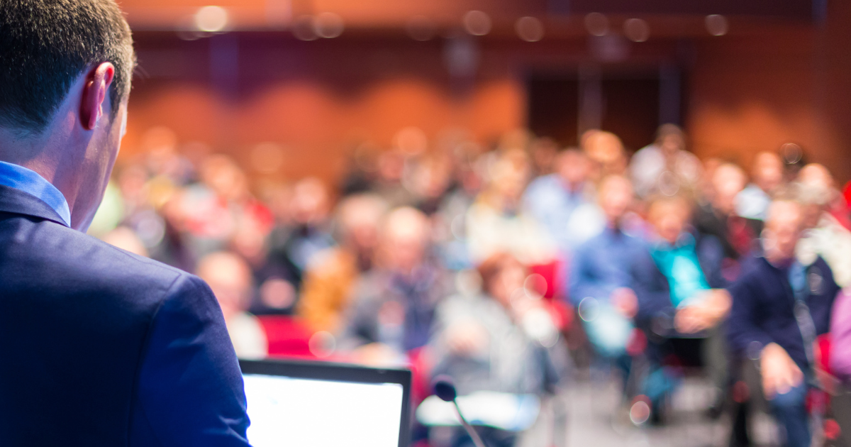 man leading a conference